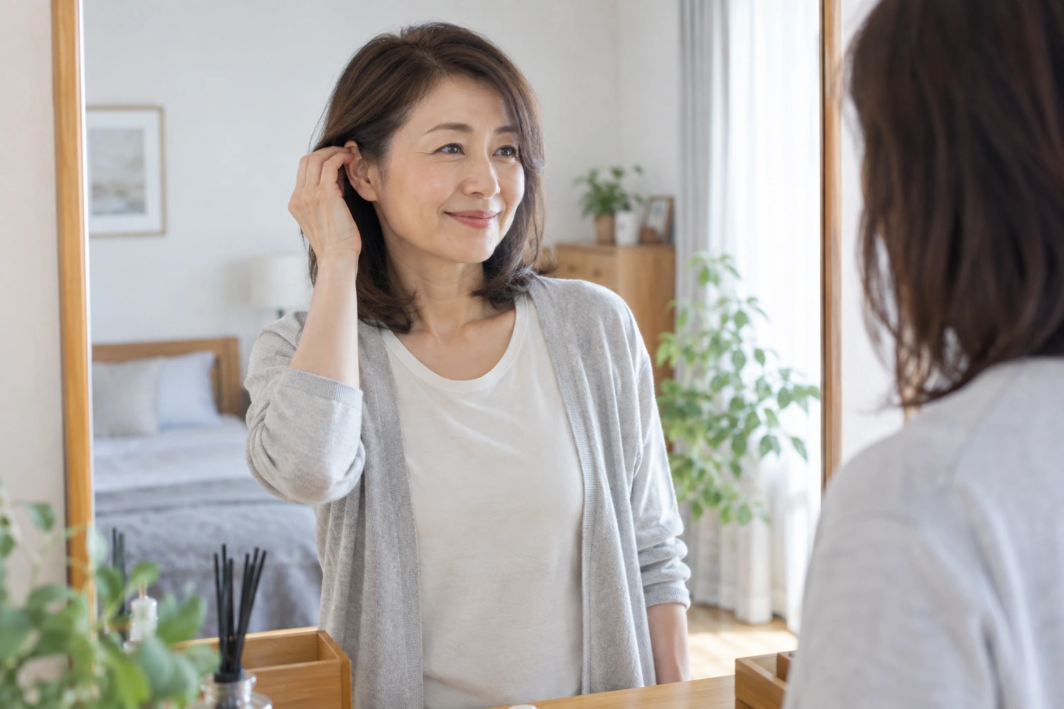 美容室で料金と施術内容を確認する女性