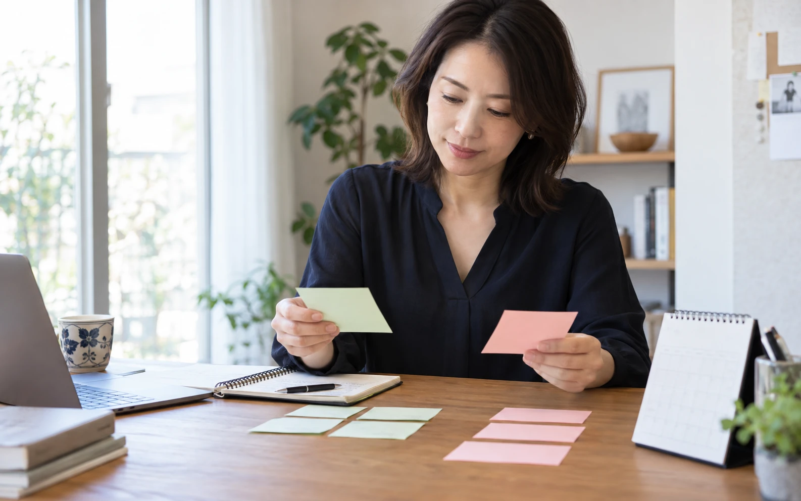 昇進と専門職と現状維持の条件を表にして比べる様子